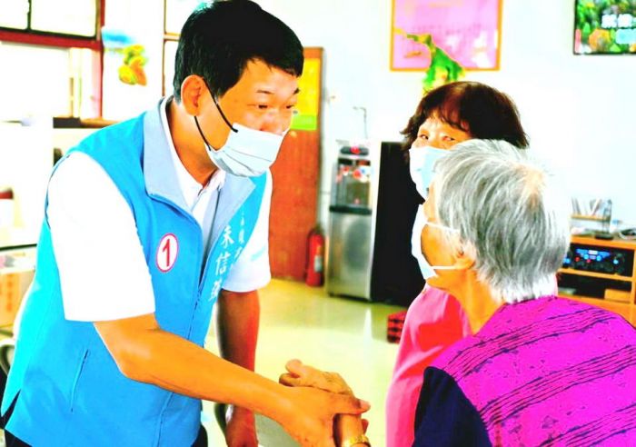 農民代言人朱信強掃街拜票